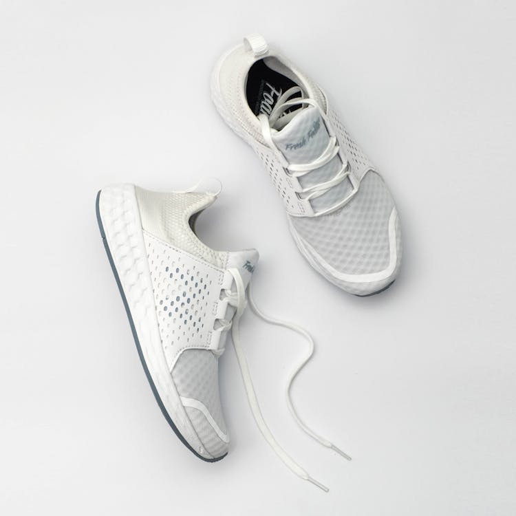 Free Grey sneakers with dense surface of texture for comfortable everyday wearing Stock Photo