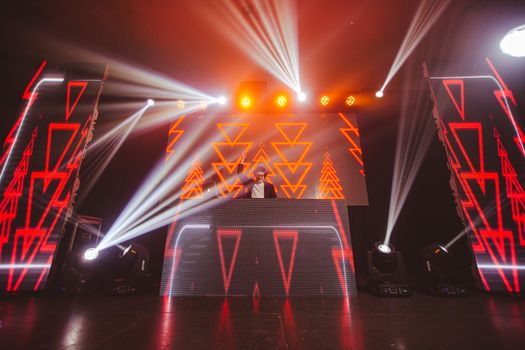 Frame preview of an AI EDM music video — laser grid