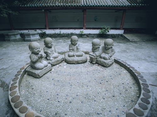 Statues of Buddhist Monks in a Garden 