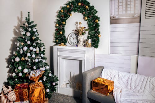 Gifts and Christmas Tree with Baubles in Living Room
