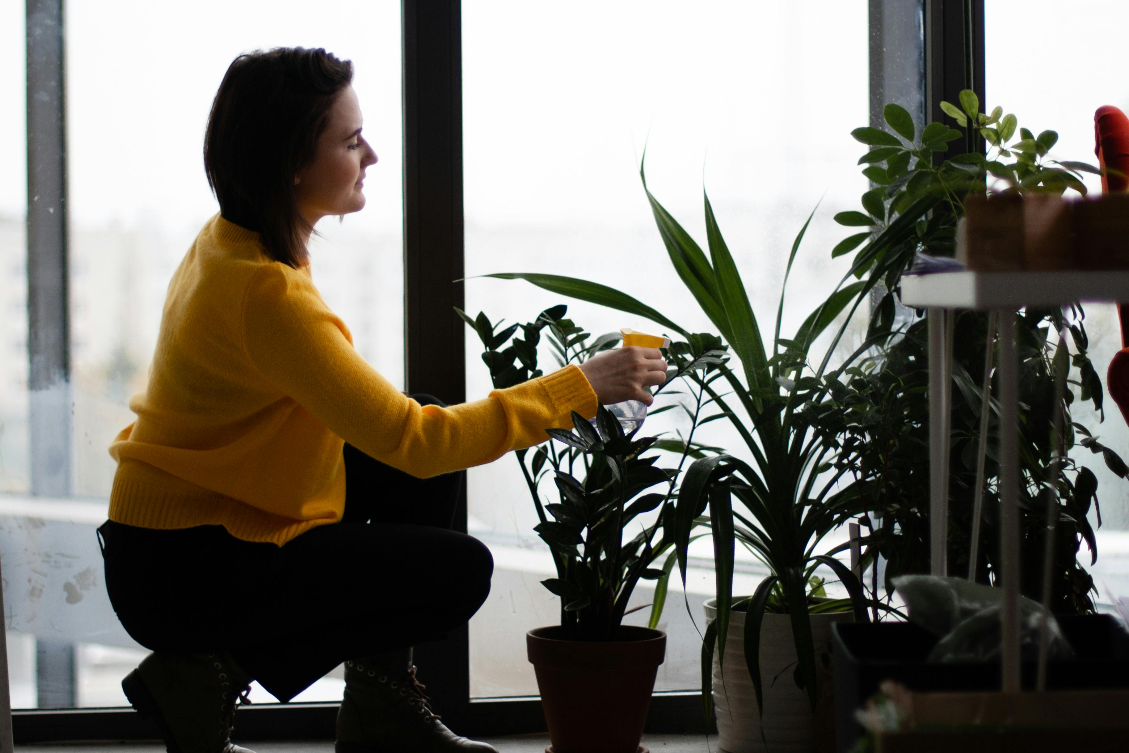 Woman Watering Plants