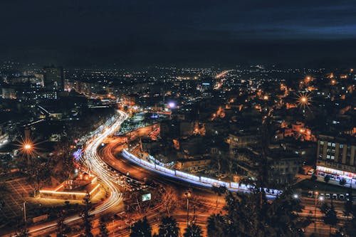 Aerial View of an Illuminated City at Night 