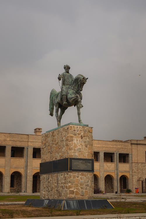 Equestrian Statue in front of a Building
