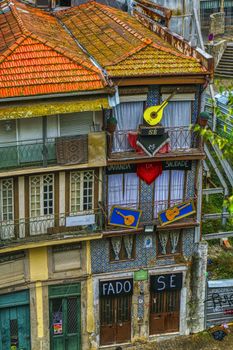 Vibrant traditional building facade in Porto, Portugal, showcasing local cultural elements.