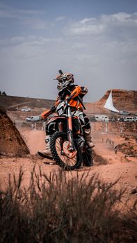 Dynamic motocross rider tackling a dirt track in Konya, Turkey. Perfect for motorsport themes.
