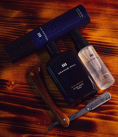 Free A detailed product shot showcasing men's grooming essentials on a wooden surface. Stock Photo