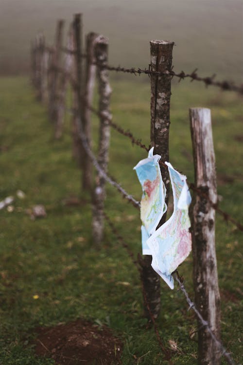 Map Hanging on Fence