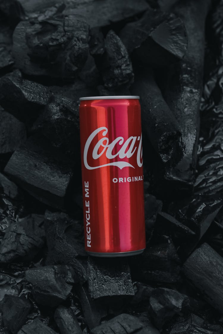 Coca Coal Can On A Black Stones