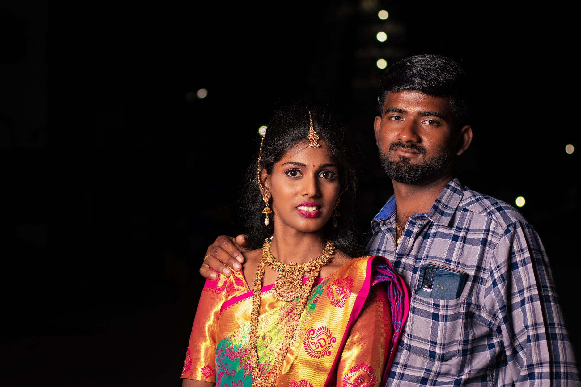 Beautiful portrait of a newlywed couple in Chennai, India, in traditional attire.