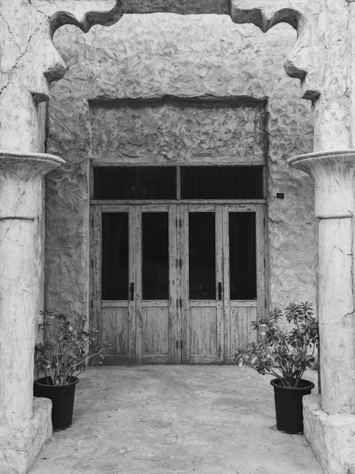 Free Grayscale Photo of a White Wooden Doors Stock Photo