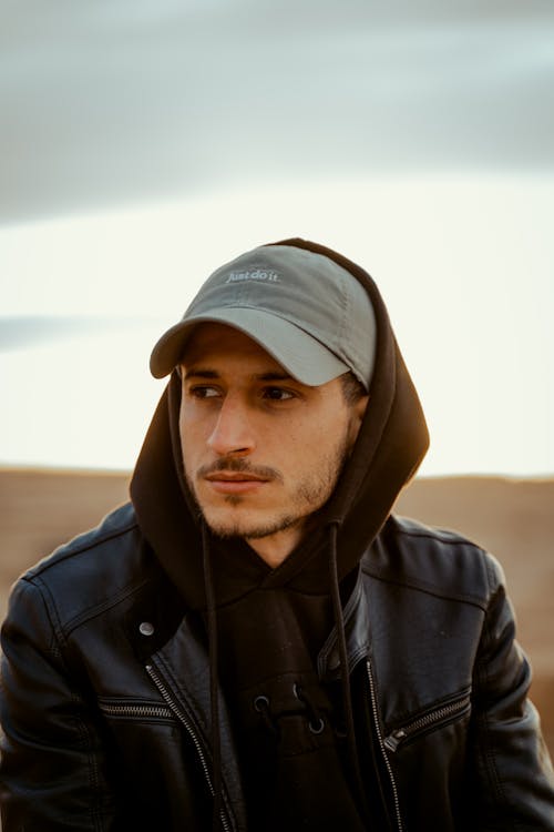 Man in Cap, Hoodie and Jacket