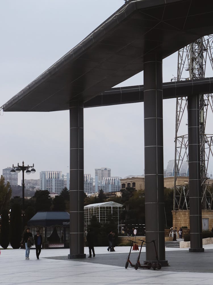 People Walking On An Urban Square