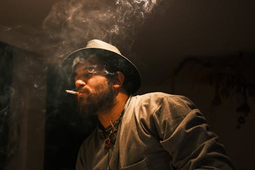 Bearded Man Smoking a Cigarette