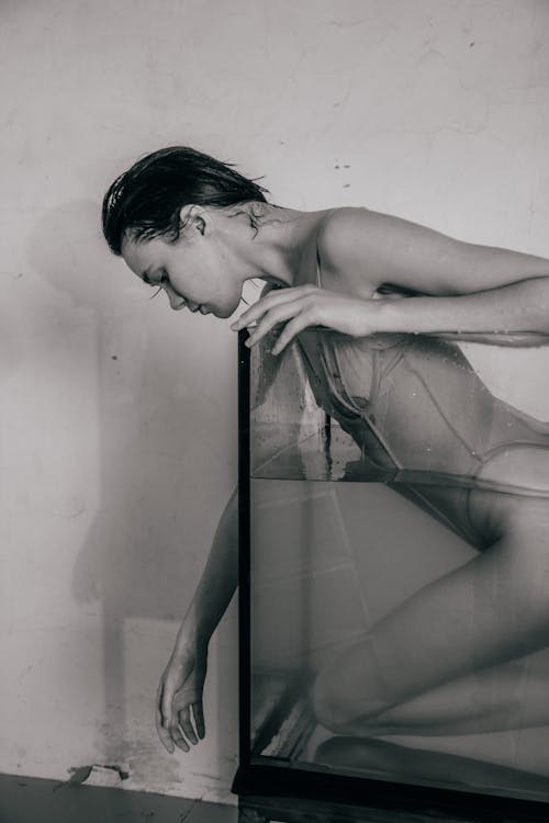 Woman Posing in an Aquarium