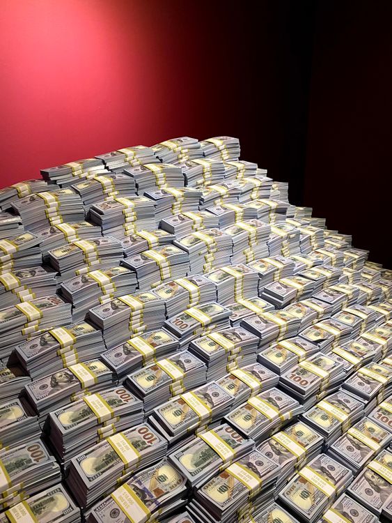 Money In Stacks A Pile of Money Stacked on Top of Each Other · Free Stock Photo