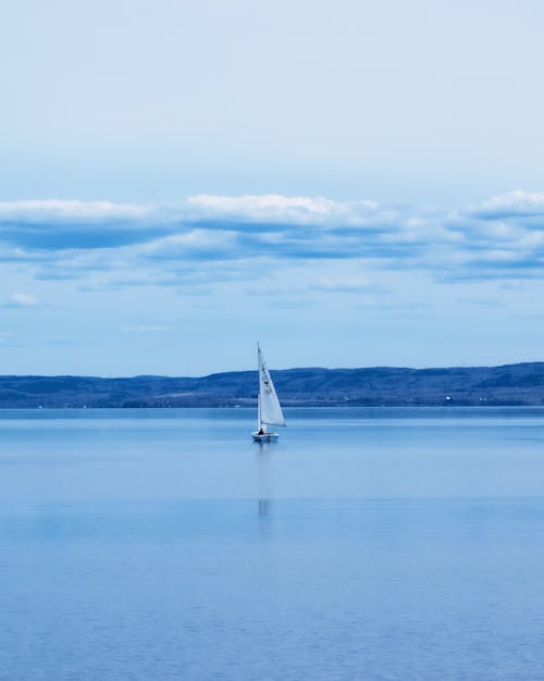 Sailboat on the Lake Surface