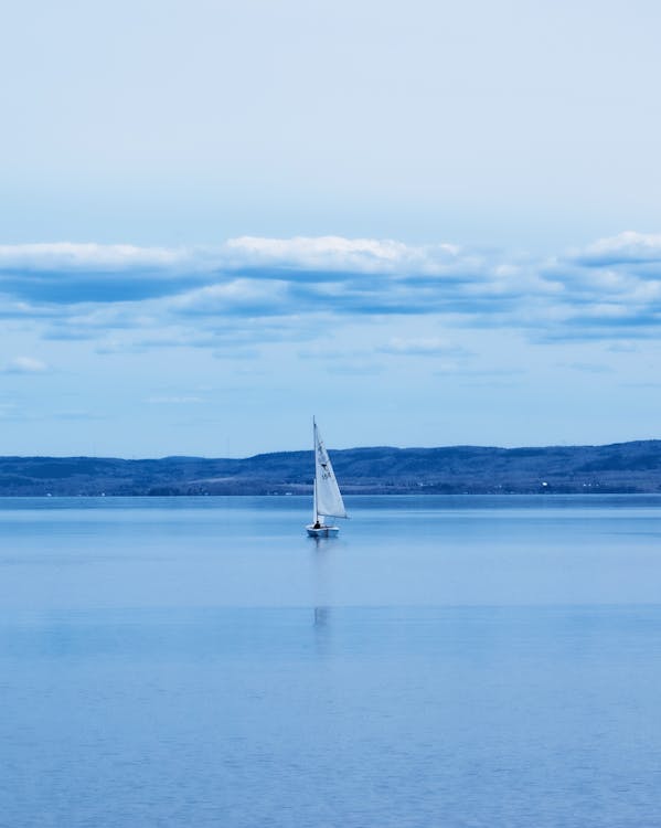 Sailboat on the Lake Surface