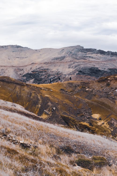 Hikers Walking on Ridge