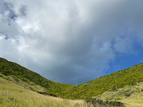 Free Green Mountain under Blue Sky and White Clouds Stock Photo