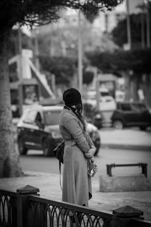 A Woman Standing on the Street