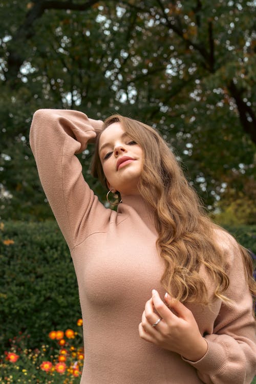 A Woman in Brown Long Sleeves