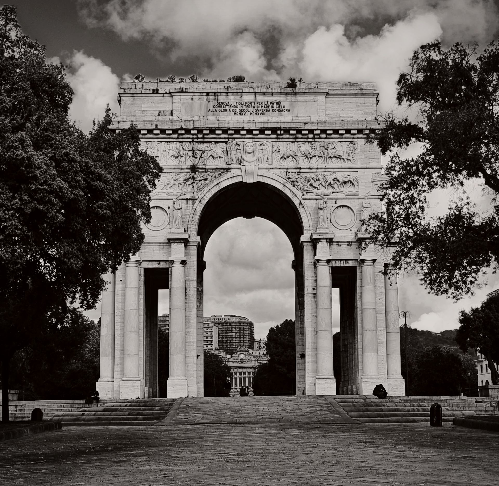 Detailed monochrome image of Arco della Vittoria in Genoa, Italy.