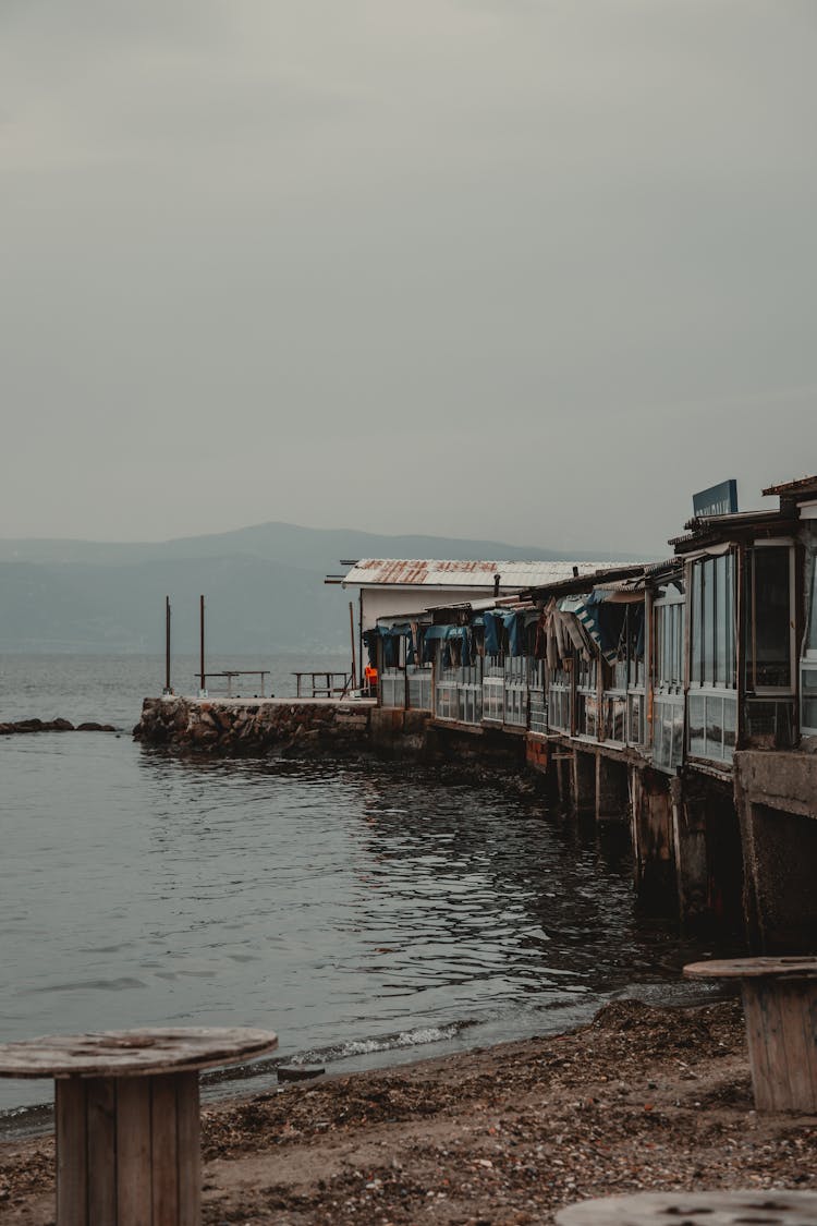 Small Cabin Built On Jetty By Lake