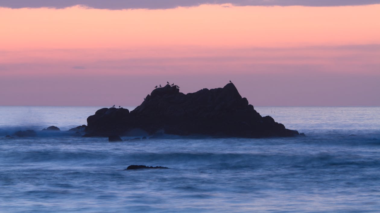 Immagine gratuita di cielo rosa, formazione rocciosa, isola