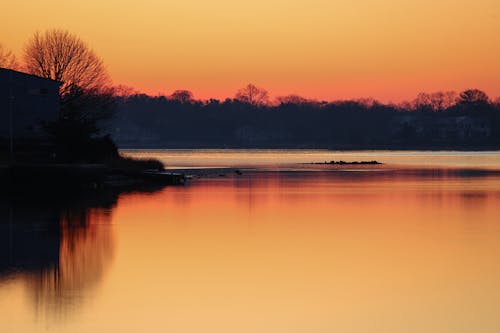 Orange Sky over Body of Water