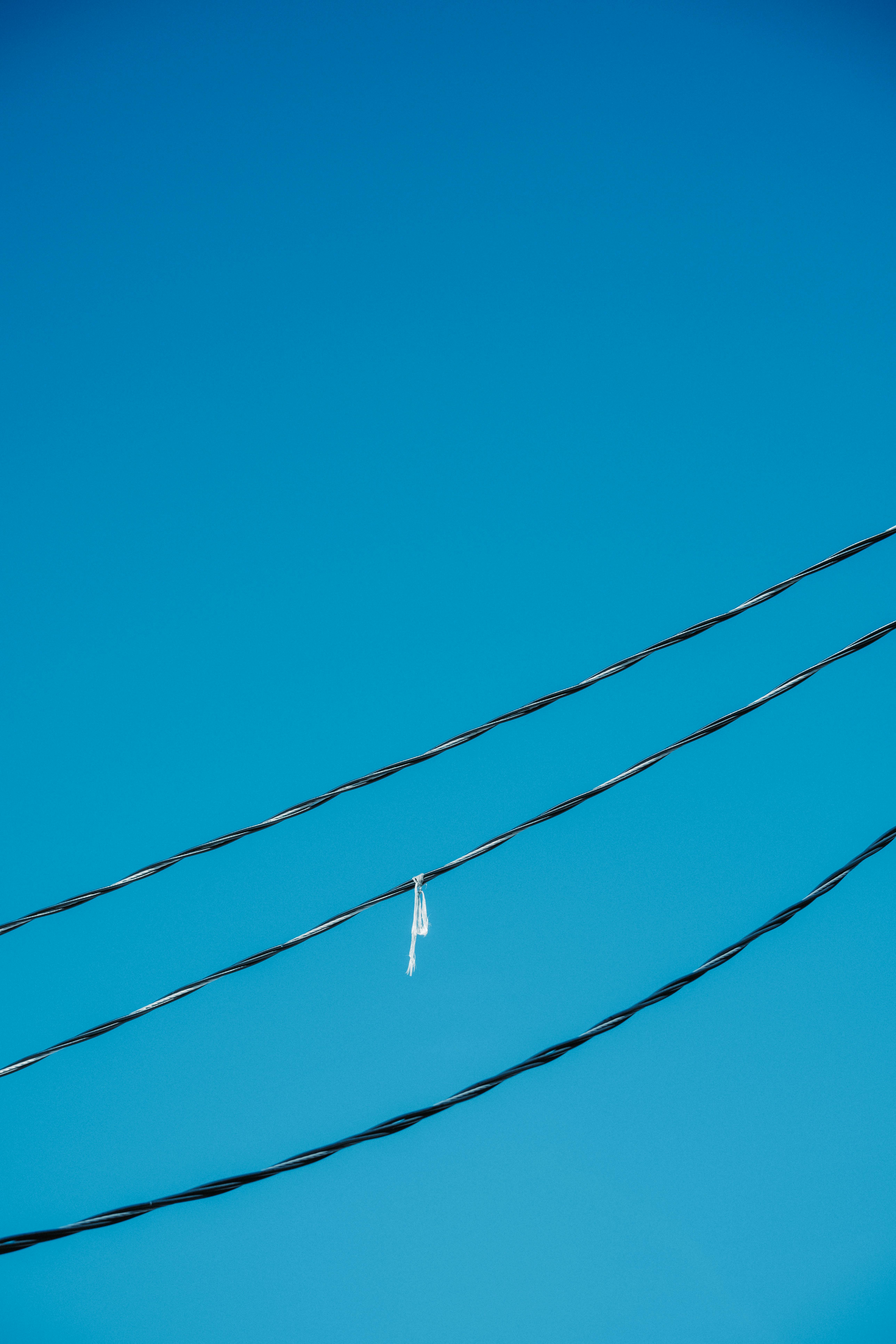 a single wire is hanging from a power line