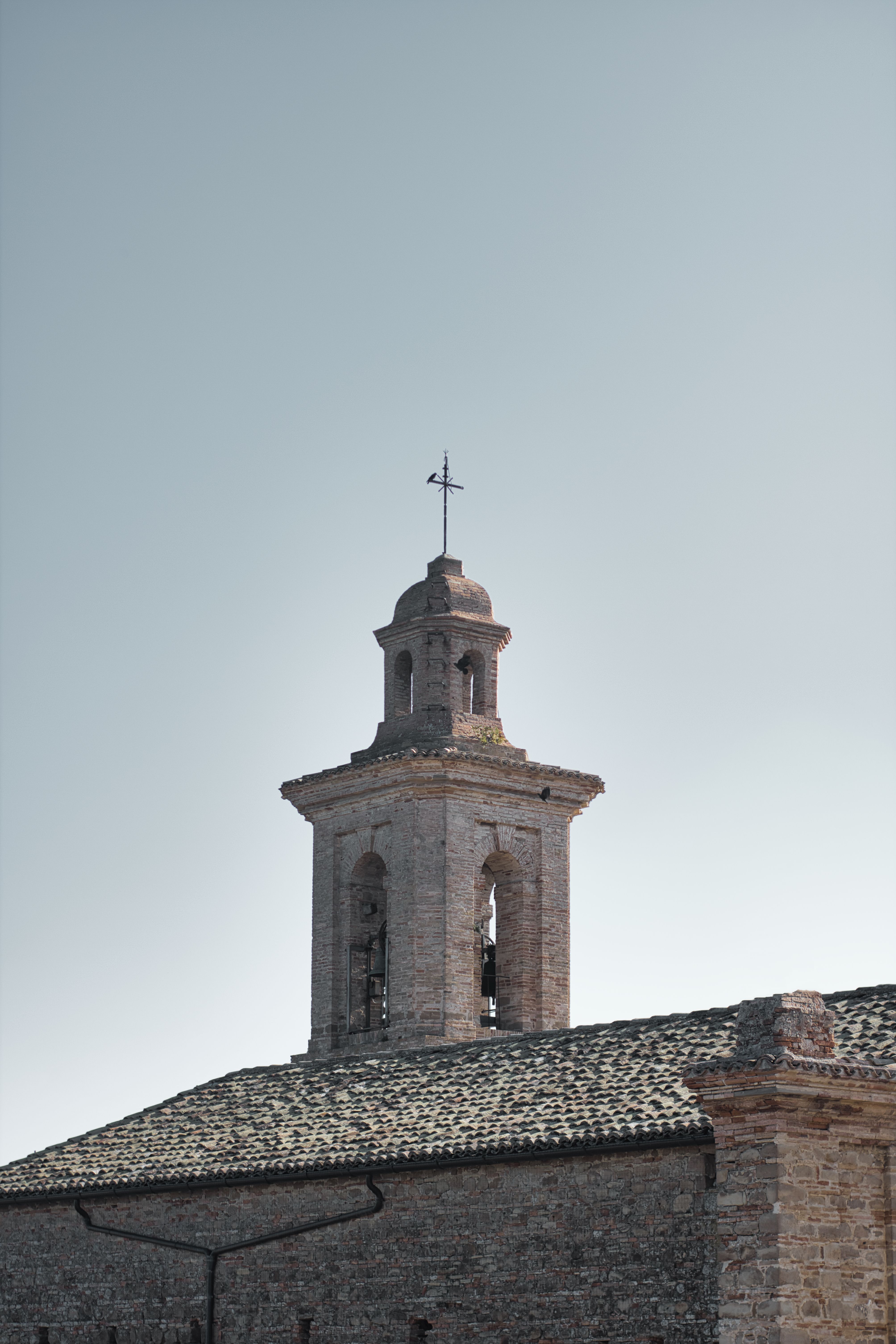 Tower of a Stone Church · Free Stock Photo