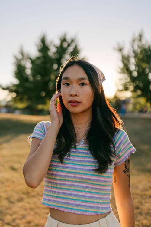 A Woman in Striped Crop Top