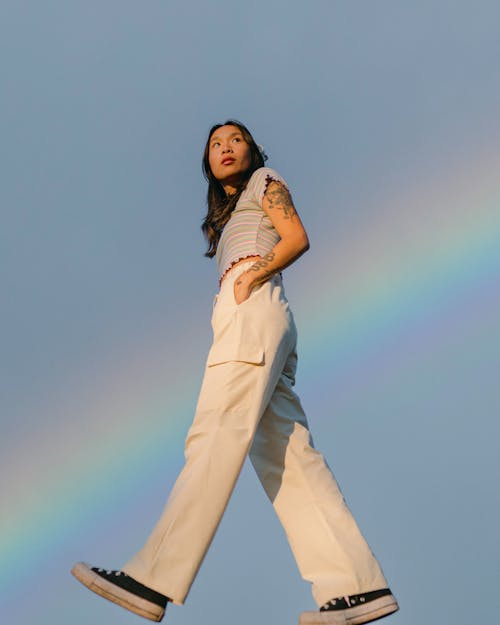 Low-Angle Shot of a Woman Wearing White Pants