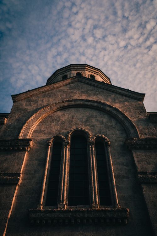 Free Upward view of a gothic structure in Istanbul, Turkey with dramatic sky. Stock Photo