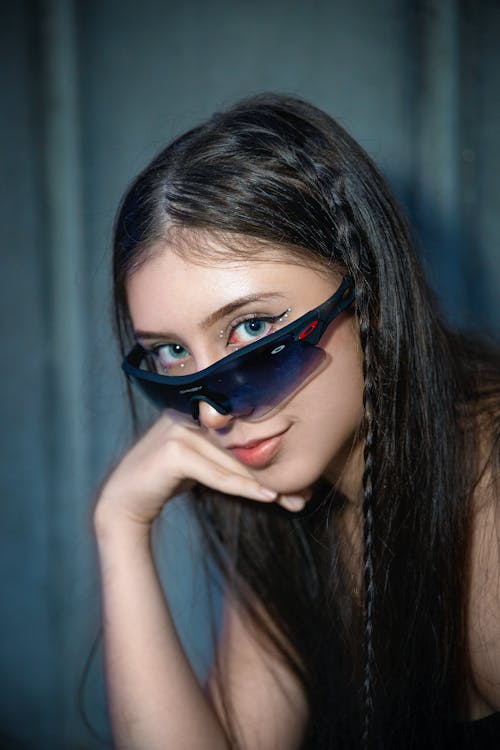 A Woman Wearing Black Sunglasses