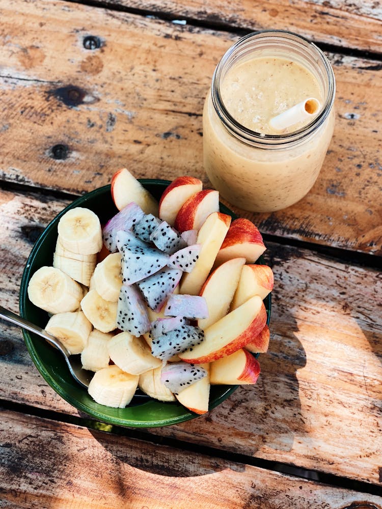 Bowl With Fruit And Jar With Cocktail With Straw