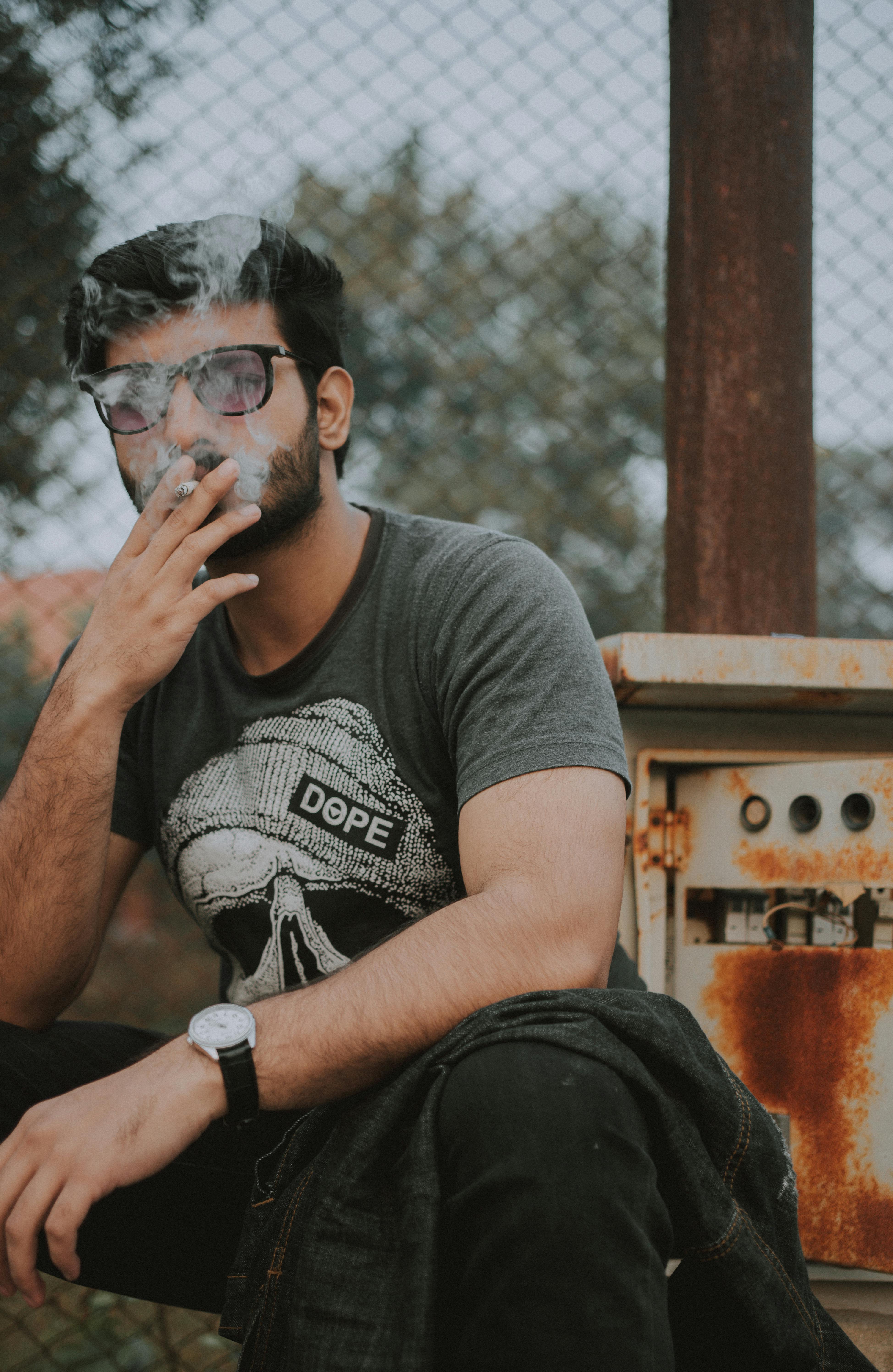 Handsome Man Smoking Cigarette · Free Stock Photo