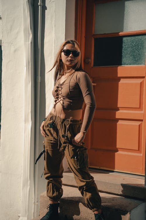 Woman in a Fashionable Outfit and Sunglasses