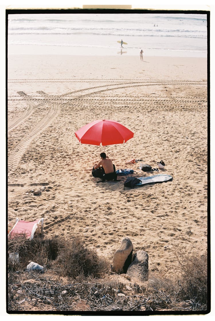 Man At The Beach In Summer