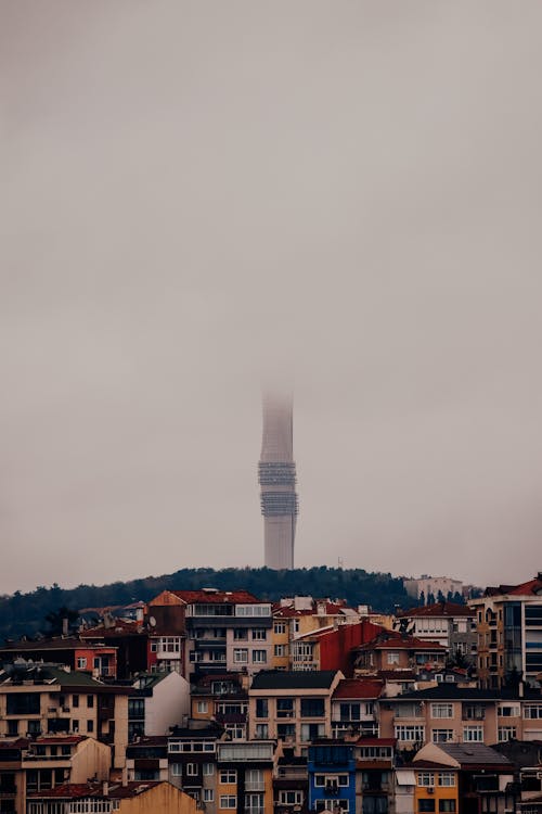 Urban Landscape with a Tower in Fog