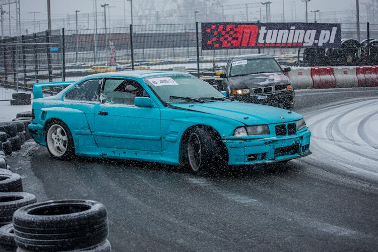 Blue Bmw Car On The Race Track