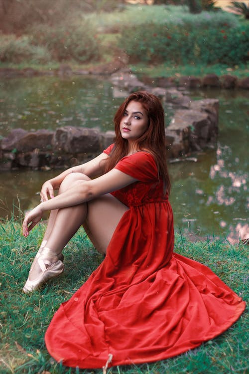 Portrait of Beautiful Woman in Red Dress 