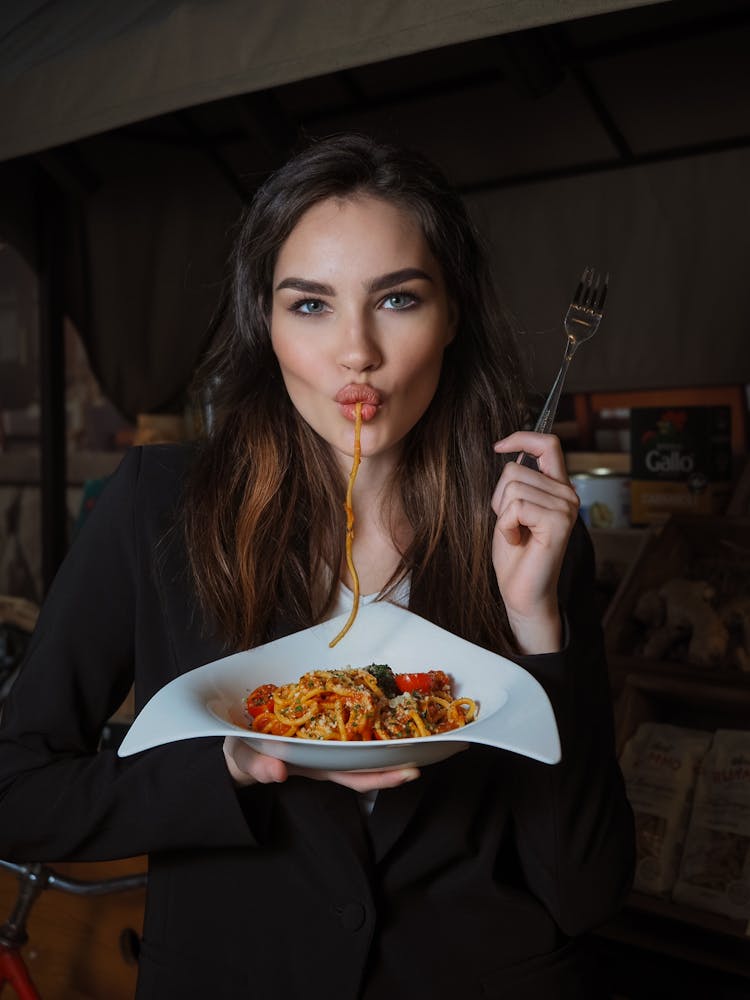 Woman Eating Spaghetti