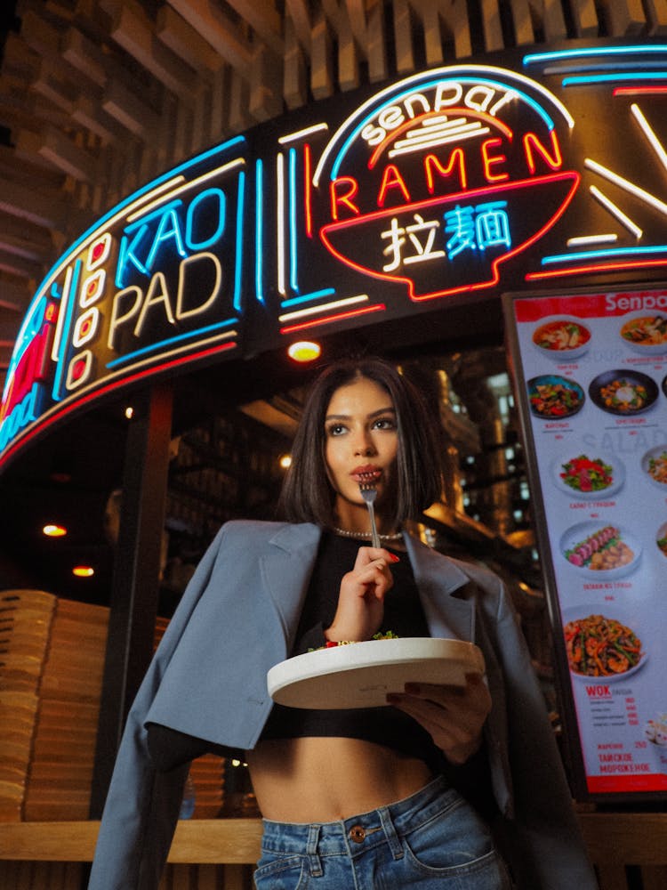 Woman Eating At Ramen Bar