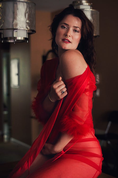 Woman Posing in a Red Dress 