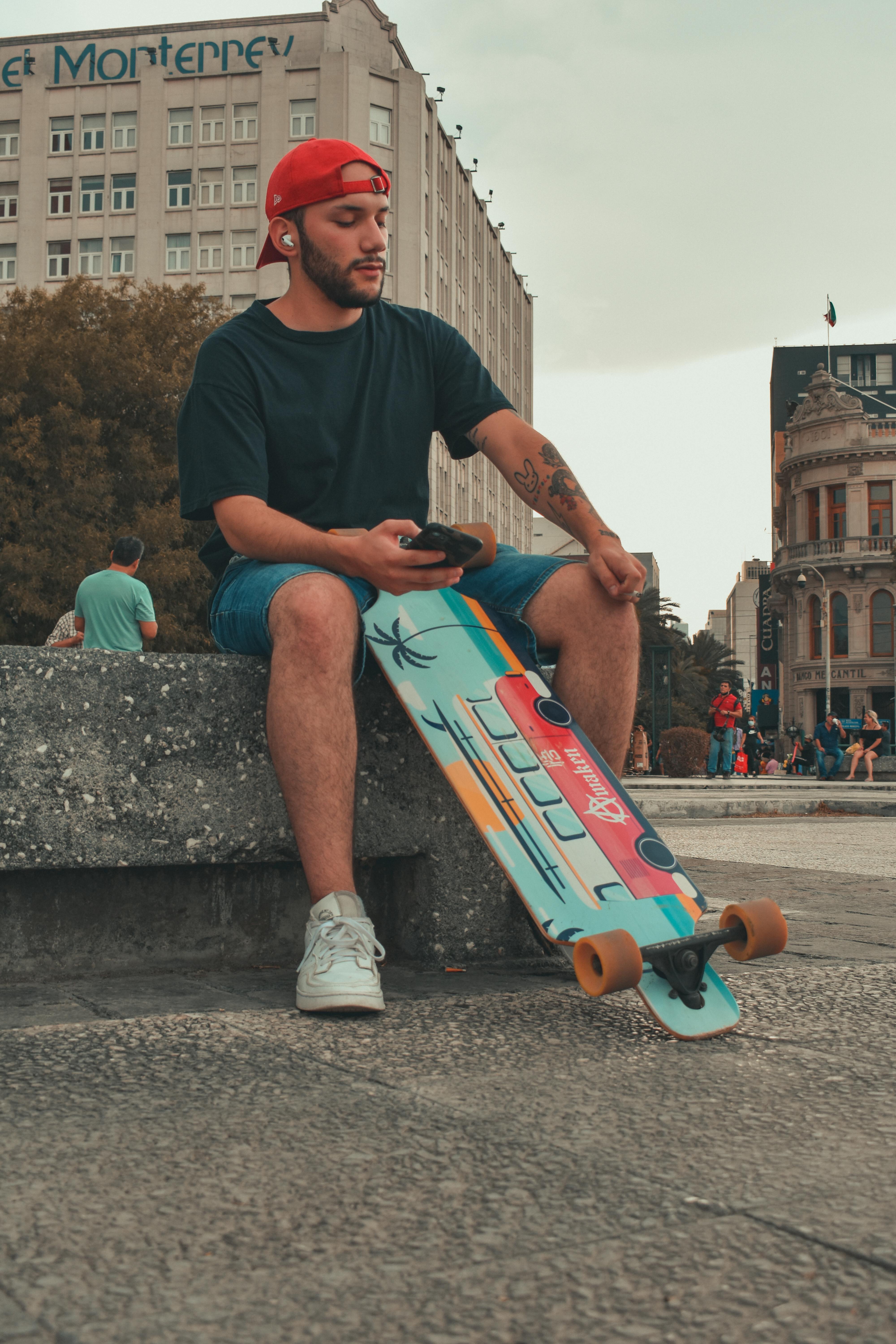 man with a skateboard on a square