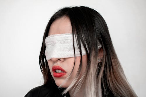 Woman with Eyes Covered with Bandage 