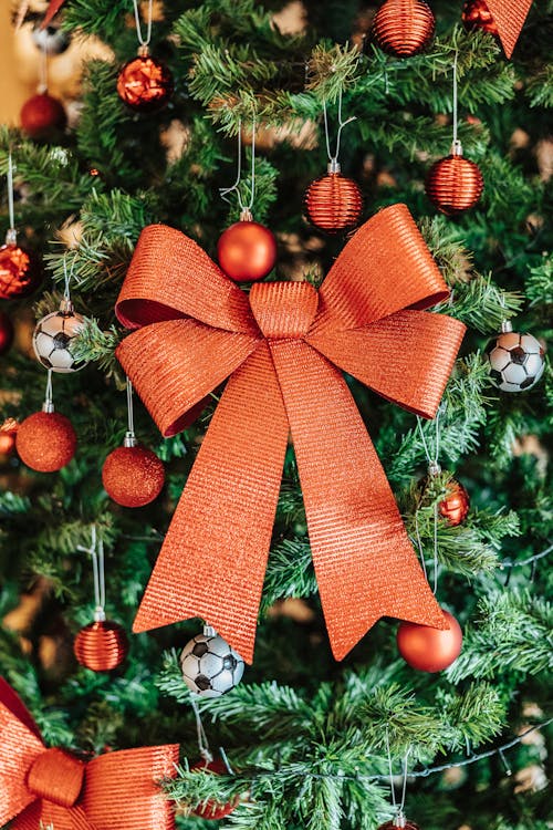 Close-up of a Red Ribbon on a Christmas Tree