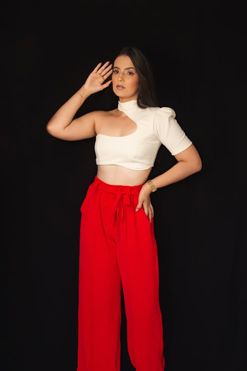 Model in White Top and Red Pants