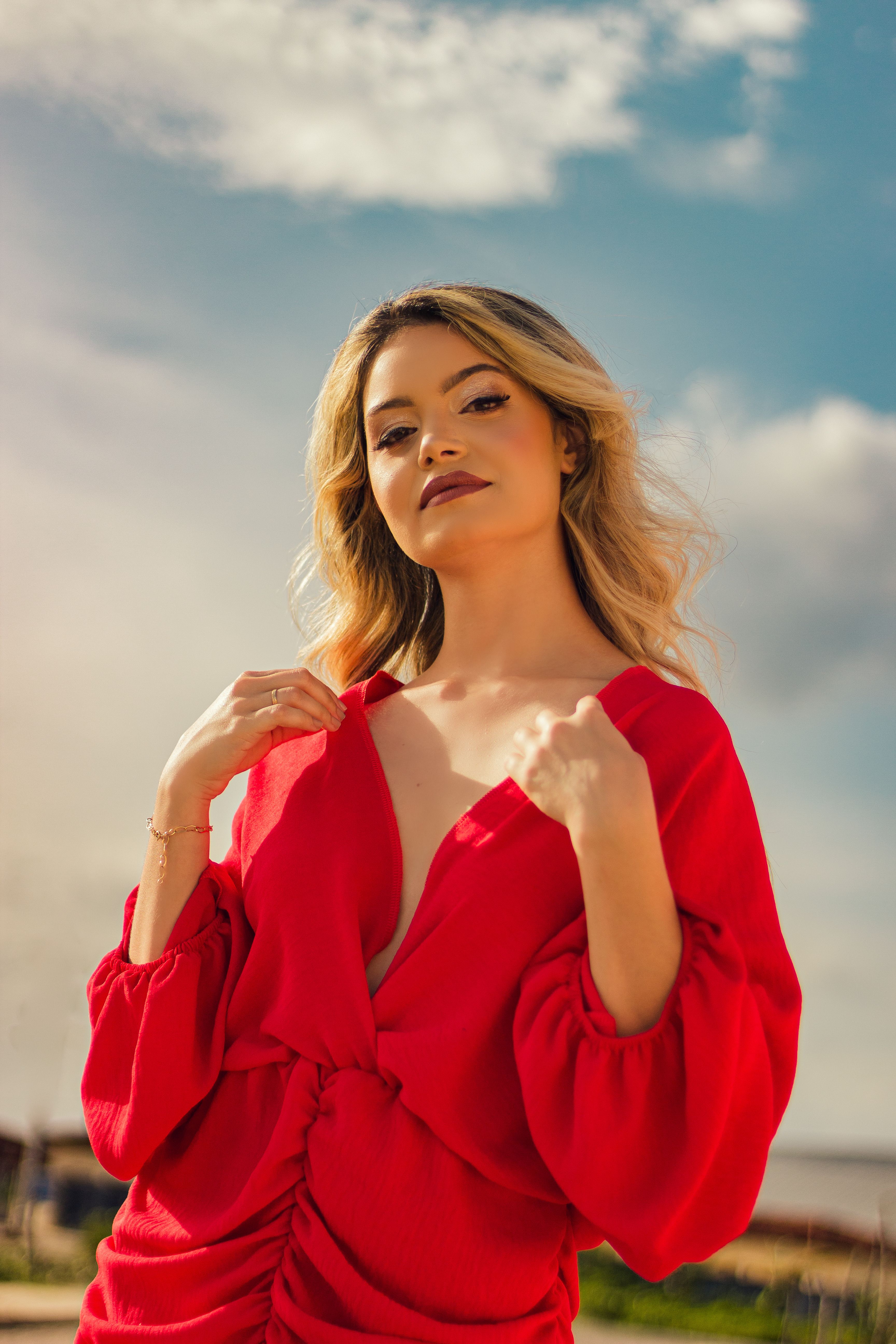 Portrait Of a Blonde Woman In a Red Dress Against the Landscape · Free ...